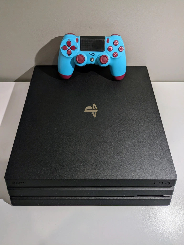 PlayStation 4 Pro 1TB w/ Berry Blue Controller